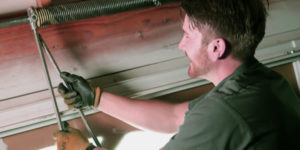 Garage Door Spring Adjustment - Jordan Garage Door Pros