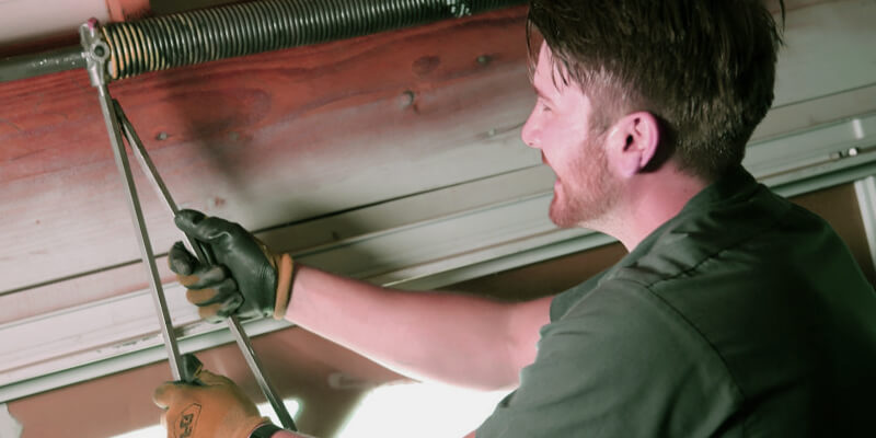 Garage Door Spring Adjustment - Jordan Garage Door Pros